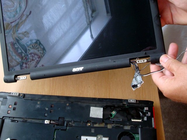 Detach the LCD module from the laptop