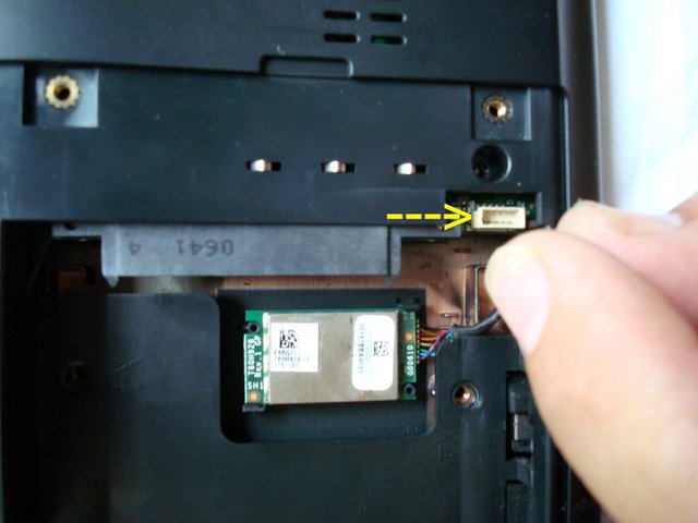 Turn over the main unit and disconnect the bluetooth cable from the main board