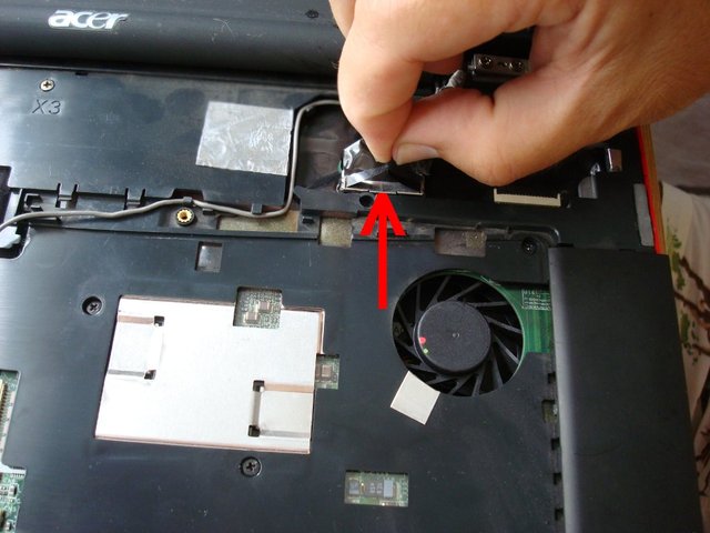 Disconnect the LCD cable from the main board