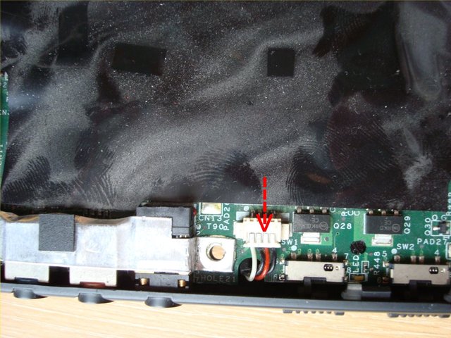 Disconnect the speaker set cable from the main board